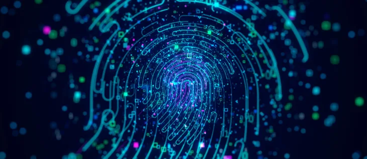 An image with lines that include binary code and shape that looks like a fingerprint to reference cybersecurity