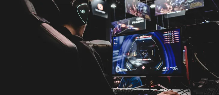 A esports team playing games in a competition event
