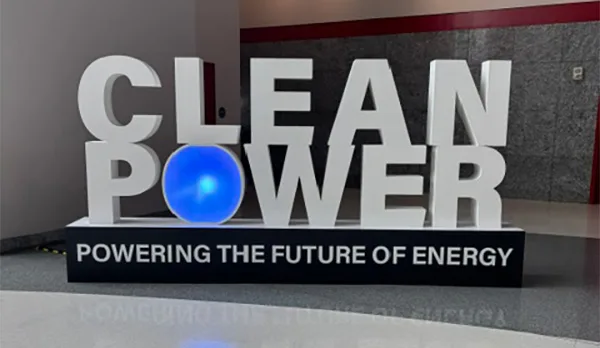 IMG_8124 CLEANPOWER conference sign with glowing blue globe and Powering the Future of Energy tagline in convention center lobby